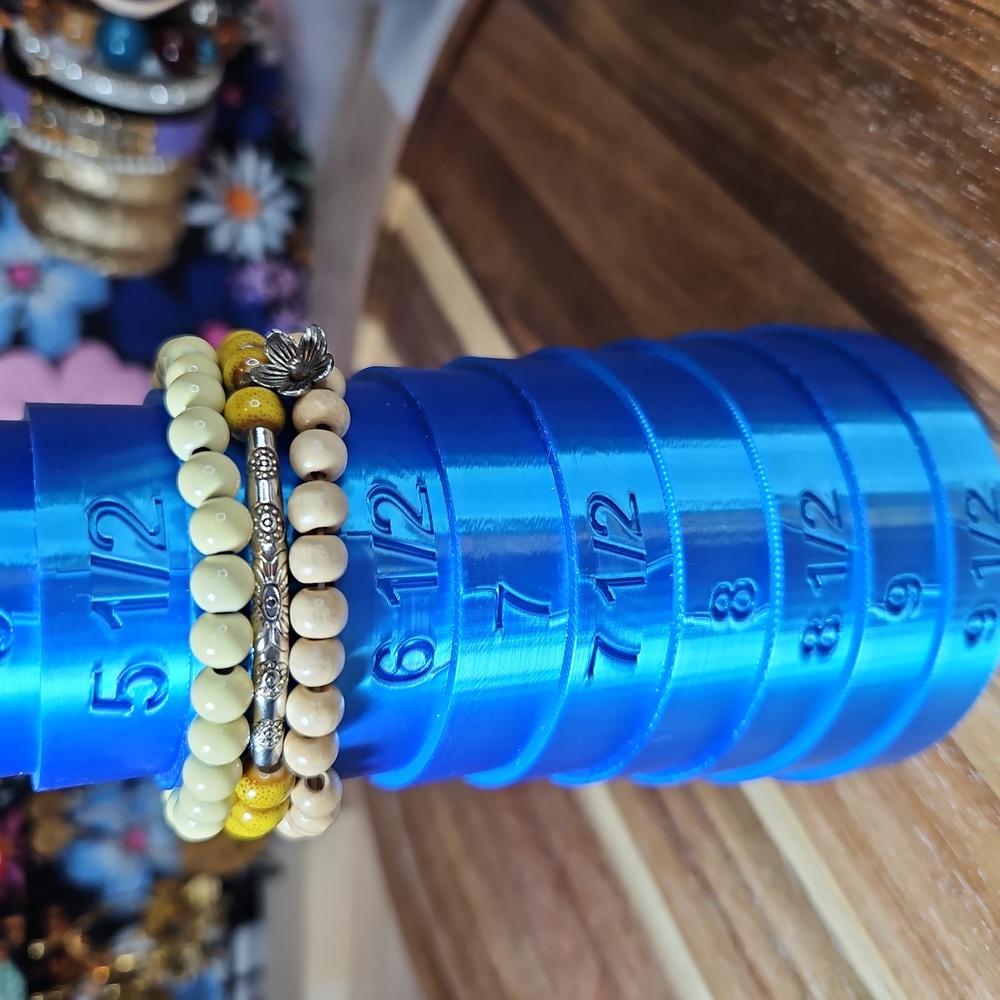 37.  3 Yellow tone stretch bracelets.